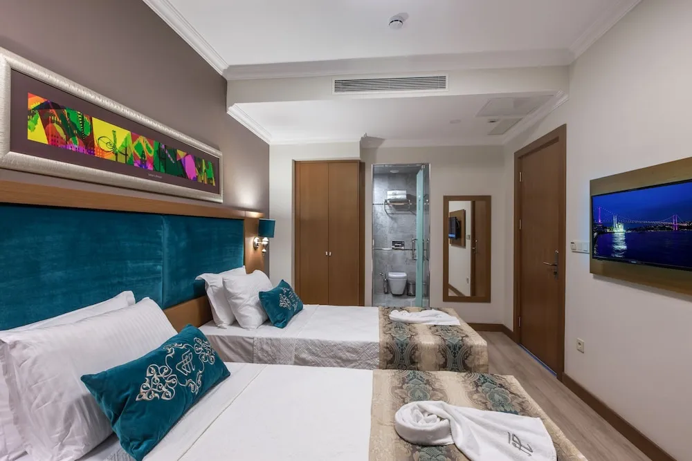 Deluxe Üç Kişilik Oda