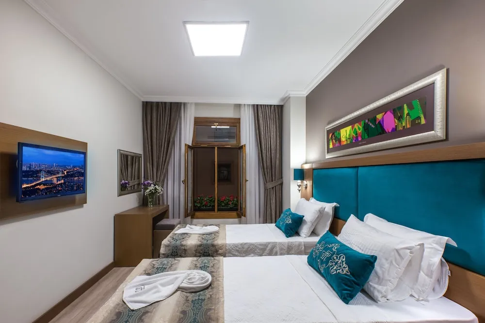 Deluxe Üç Kişilik Oda