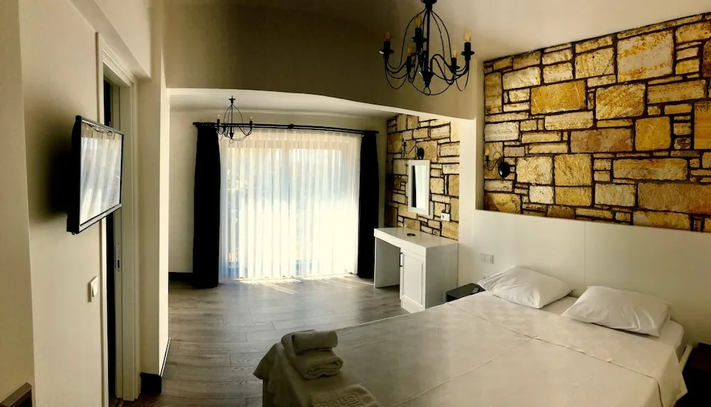 Deluxe Üç Kişilik Oda