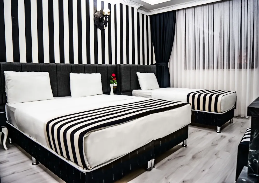 Deluxe Üç Kişilik Oda