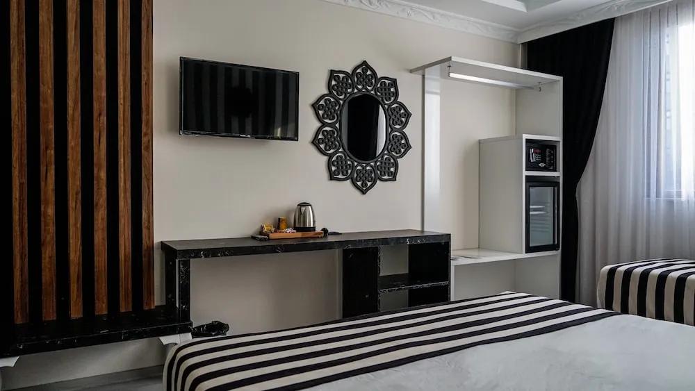 Deluxe Tek Büyük veya İki Ayrı Yataklı Oda