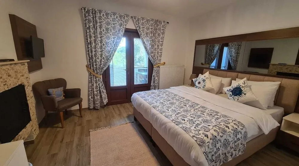 Deluxe Tek Büyük veya İki Ayrı Yataklı Oda