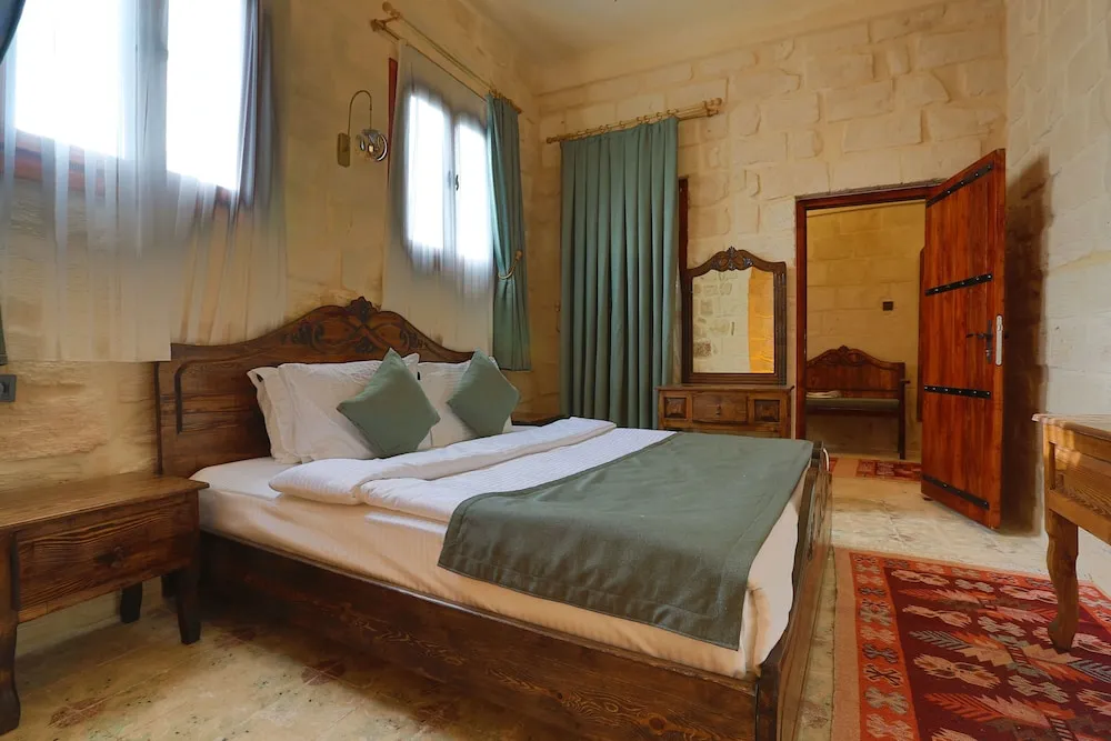 Deluxe Dört Kişilik Oda, Bahçe Manzaralı