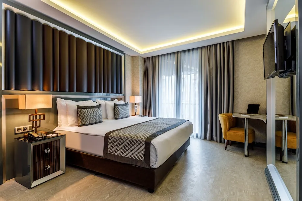 Deluxe Tek Büyük veya İki Ayrı Yataklı Oda
