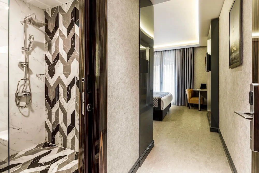 Deluxe Tek Büyük veya İki Ayrı Yataklı Oda