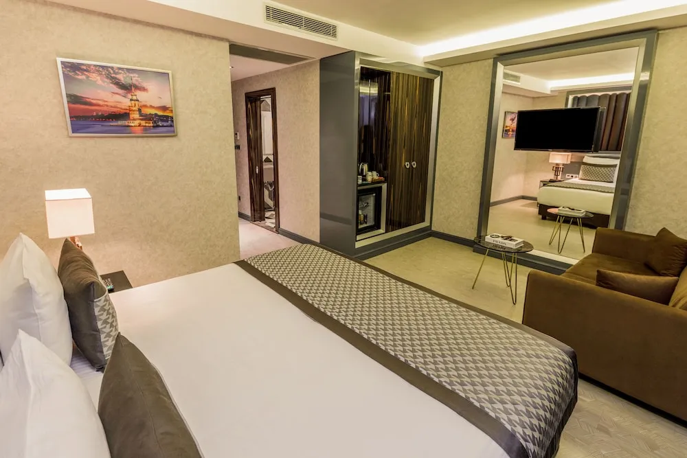 Deluxe Tek Büyük veya İki Ayrı Yataklı Oda
