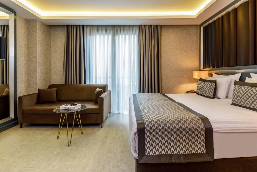 Deluxe Tek Büyük veya İki Ayrı Yataklı Oda
