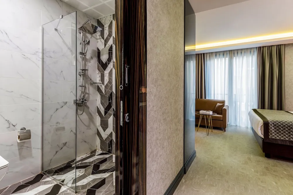 Deluxe Tek Büyük veya İki Ayrı Yataklı Oda