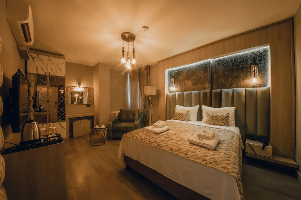 Deluxe Tek Büyük veya İki Ayrı Yataklı Oda