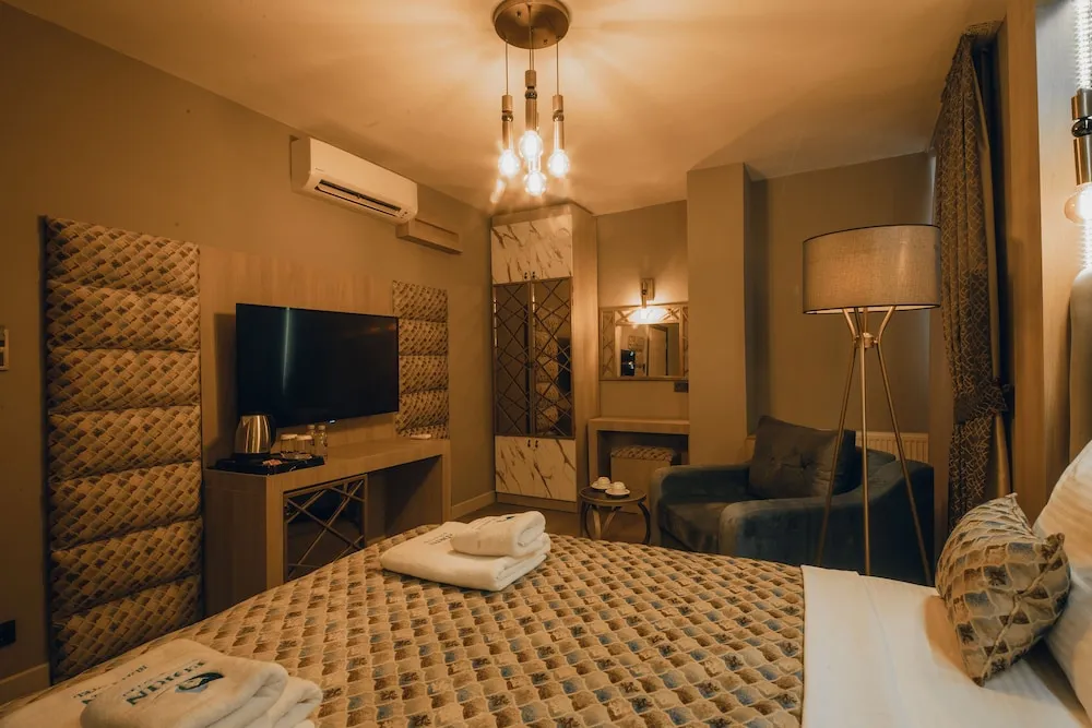 Deluxe Tek Büyük veya İki Ayrı Yataklı Oda