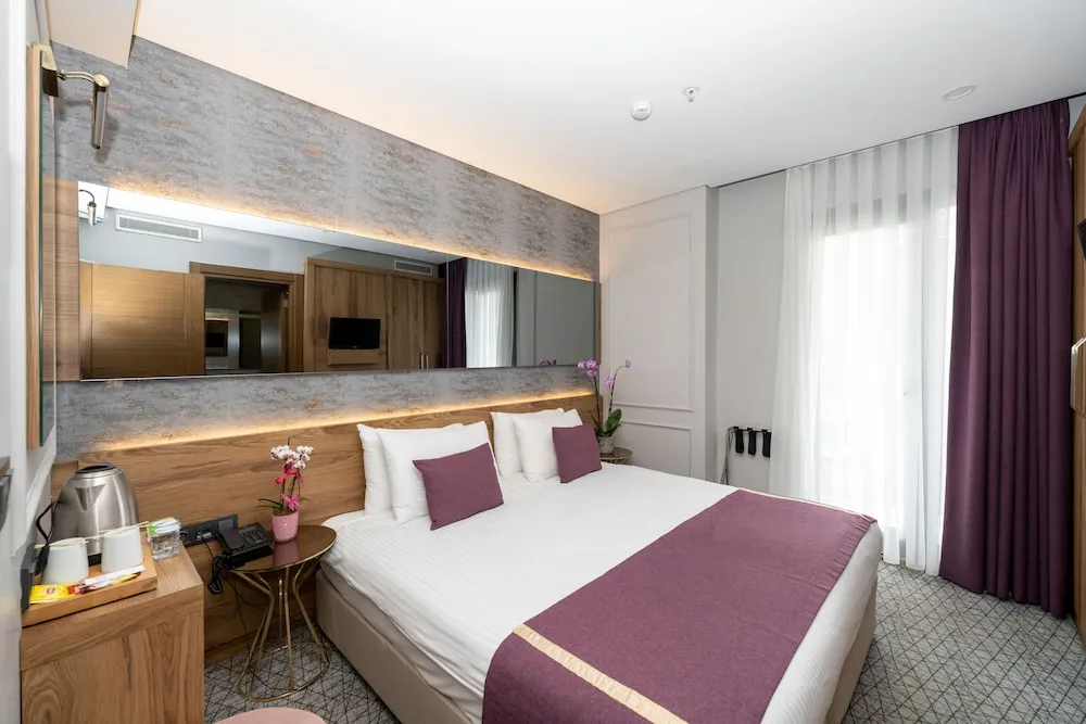 Deluxe Tek Büyük veya İki Ayrı Yataklı Oda