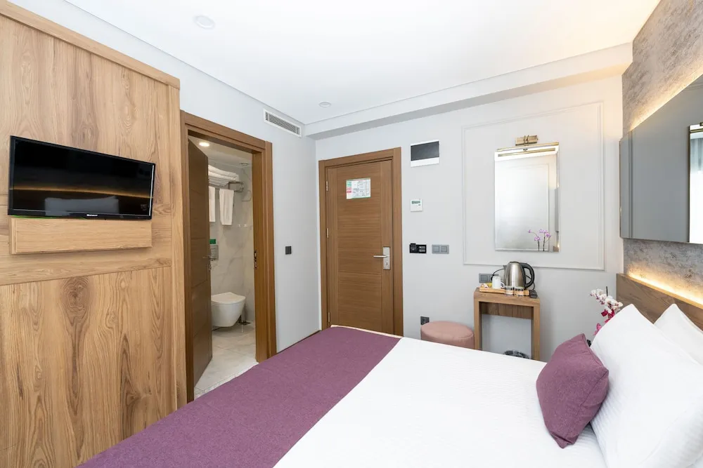 Deluxe Tek Büyük veya İki Ayrı Yataklı Oda