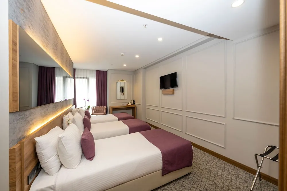 Deluxe Tek Büyük veya İki Ayrı Yataklı Oda