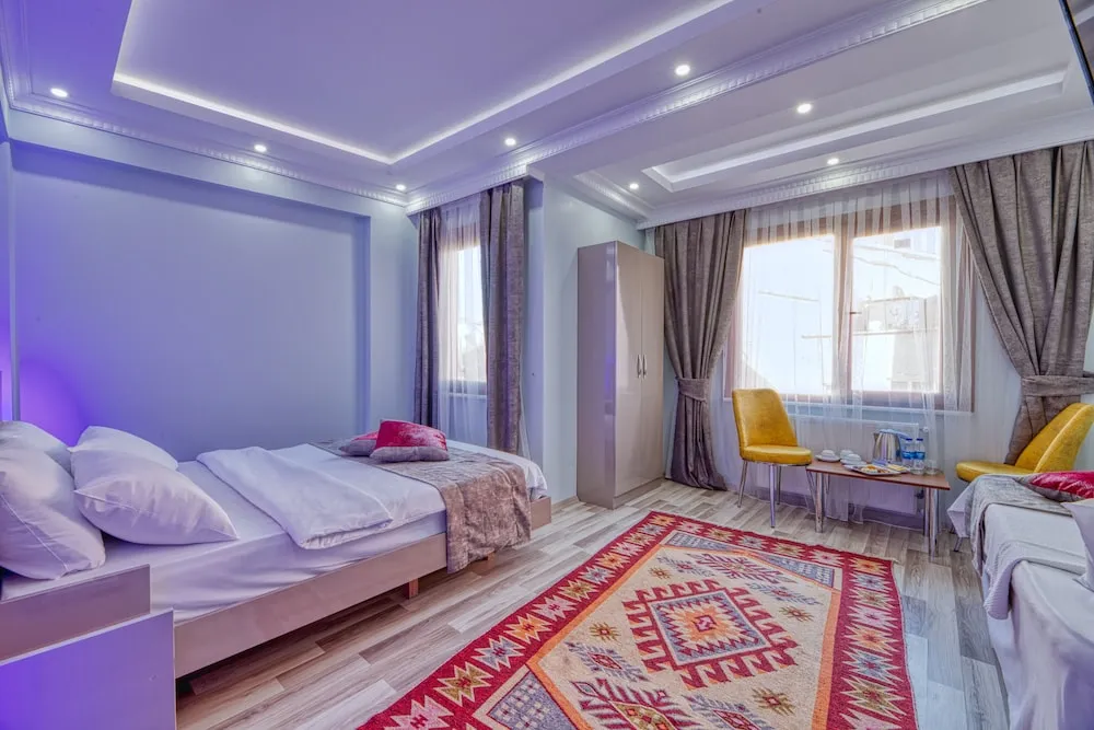 Deluxe Üç Kişilik Oda