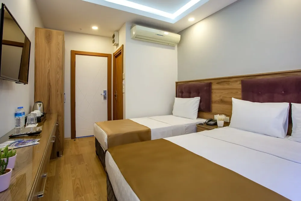 Deluxe Üç Kişilik Oda