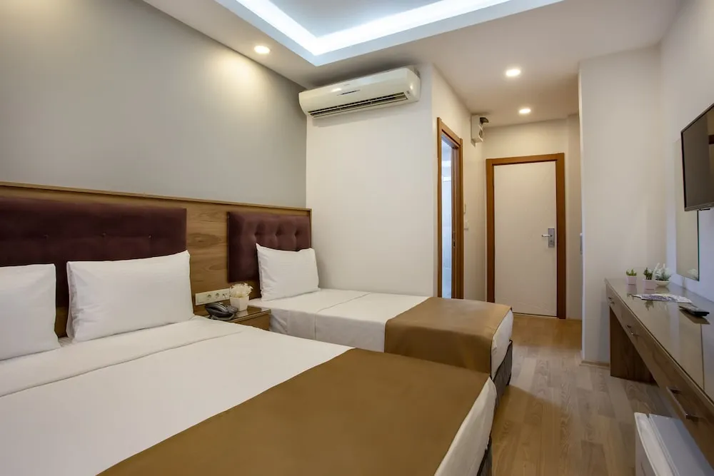 Deluxe Üç Kişilik Oda