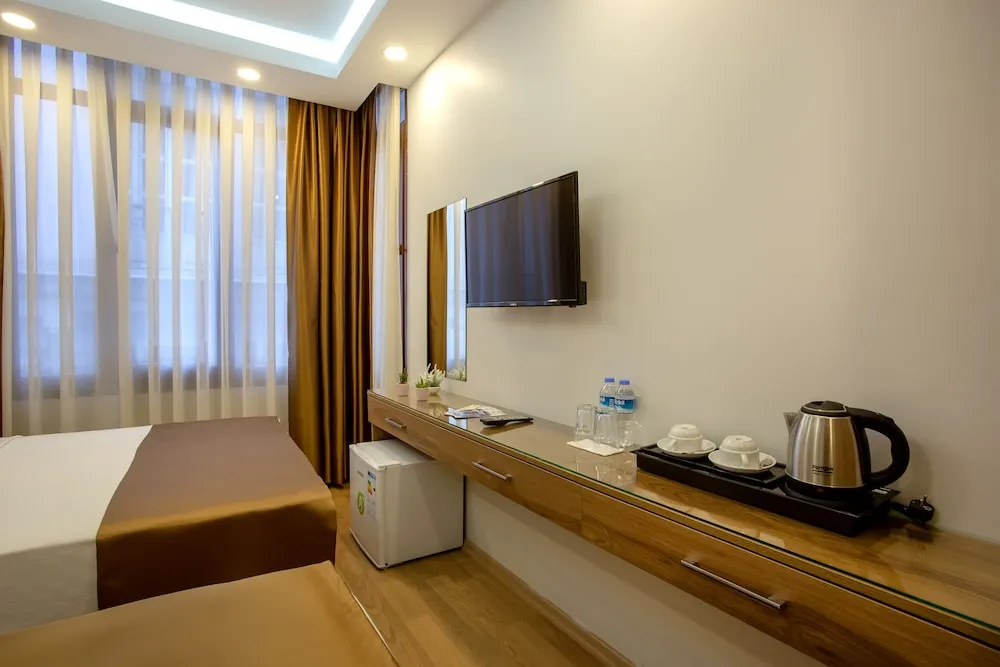 Deluxe Üç Kişilik Oda