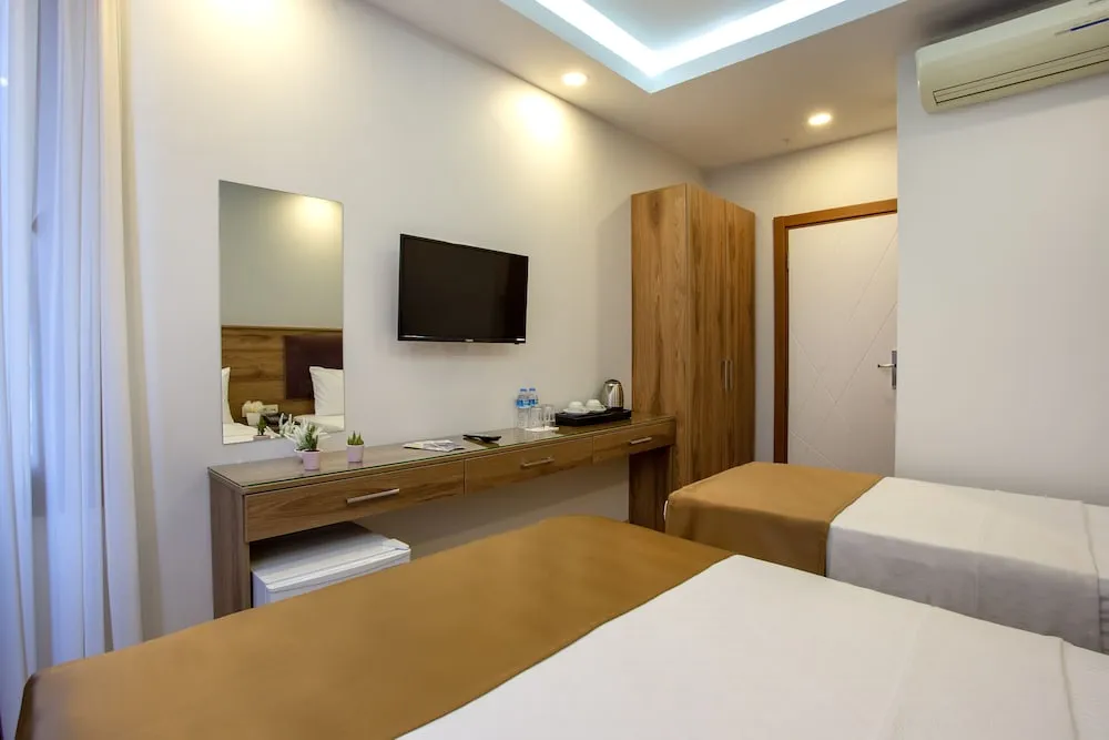 Deluxe Üç Kişilik Oda