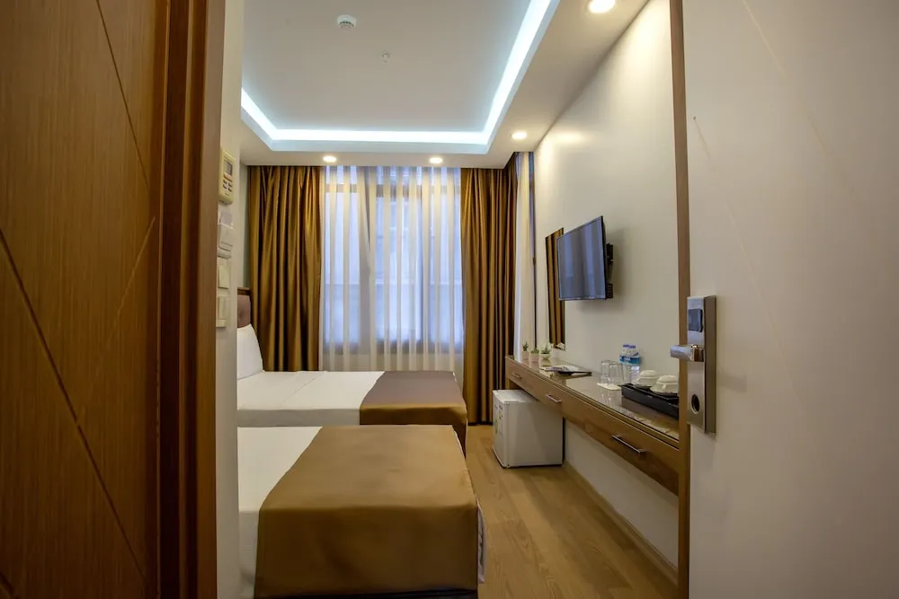 Deluxe Üç Kişilik Oda