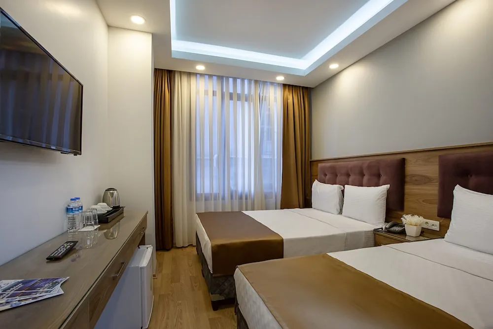 Deluxe Üç Kişilik Oda