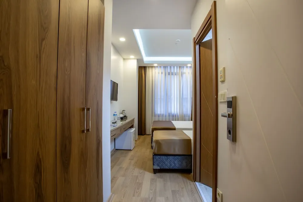 Deluxe Üç Kişilik Oda