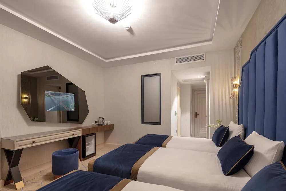 Deluxe Üç Kişilik Oda