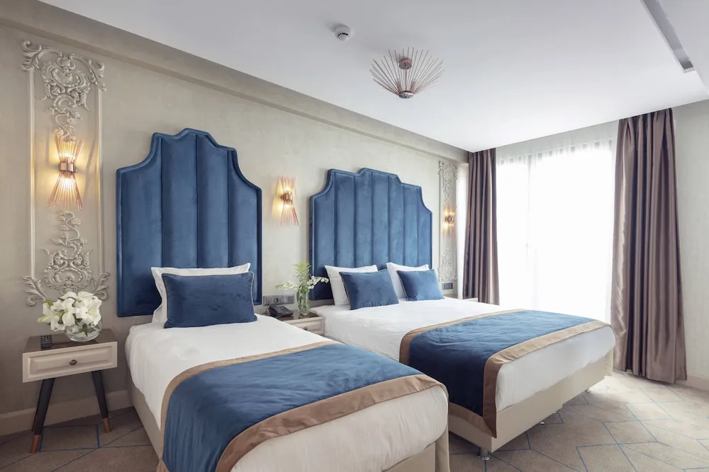 Deluxe Üç Kişilik Oda
