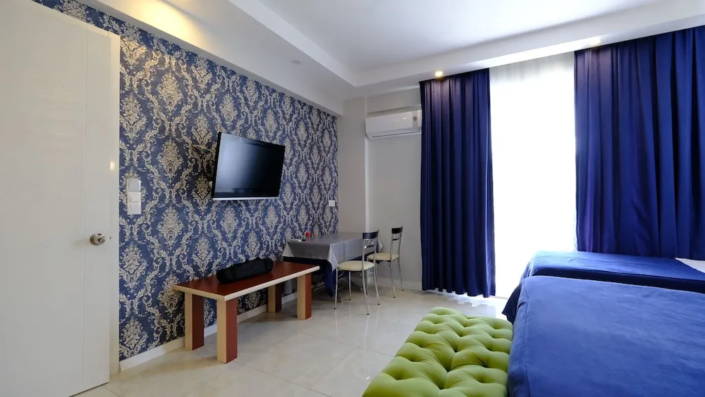 Deluxe Üç Kişilik Oda (3 People)