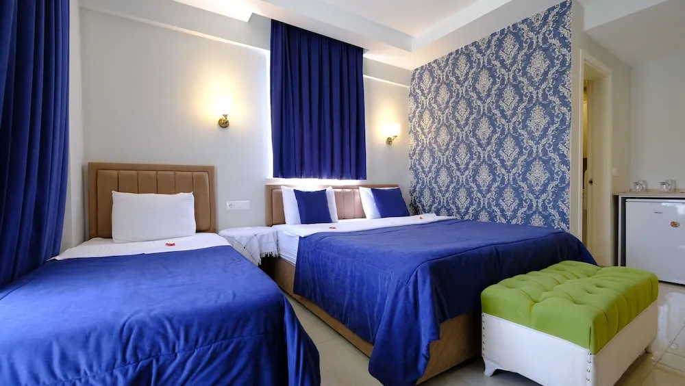 Deluxe Üç Kişilik Oda (3 People)