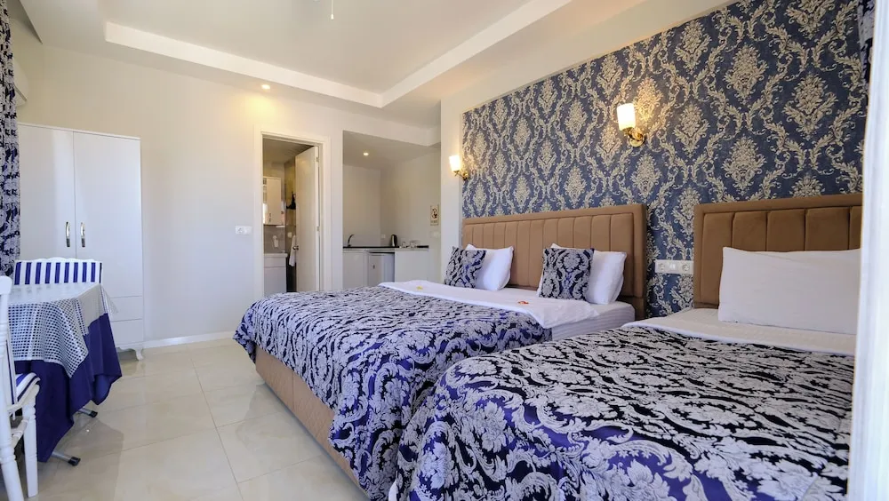 Deluxe Üç Kişilik Oda (3 People)