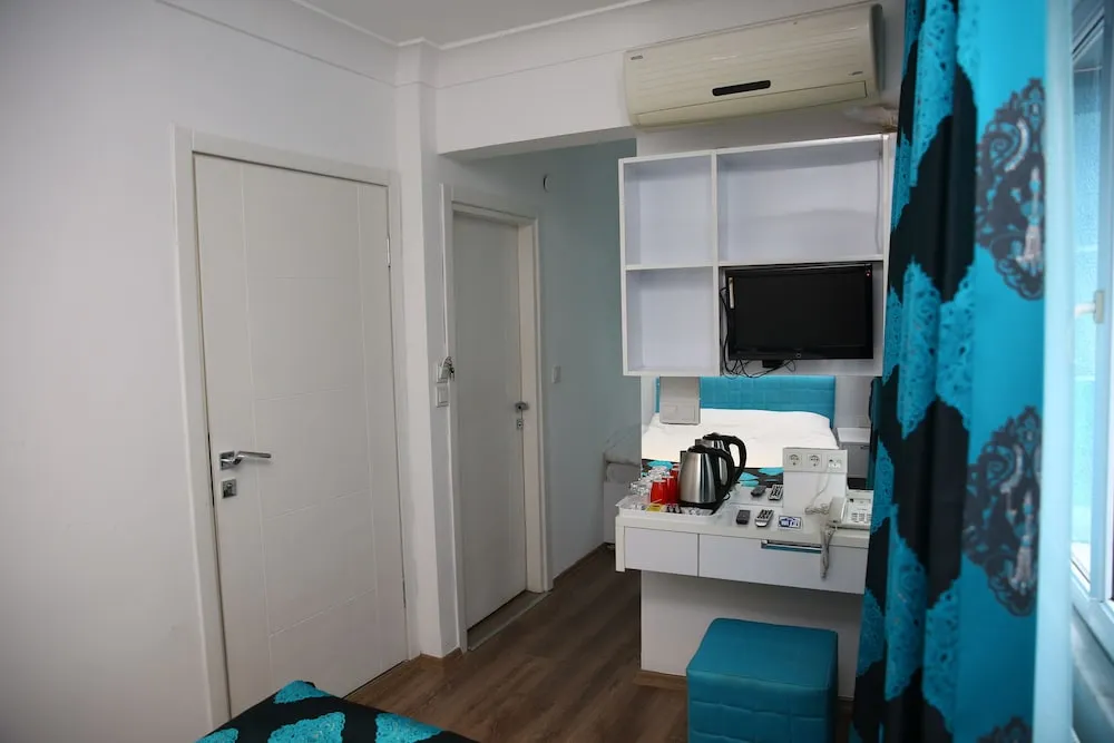 Üç Kişilik Oda