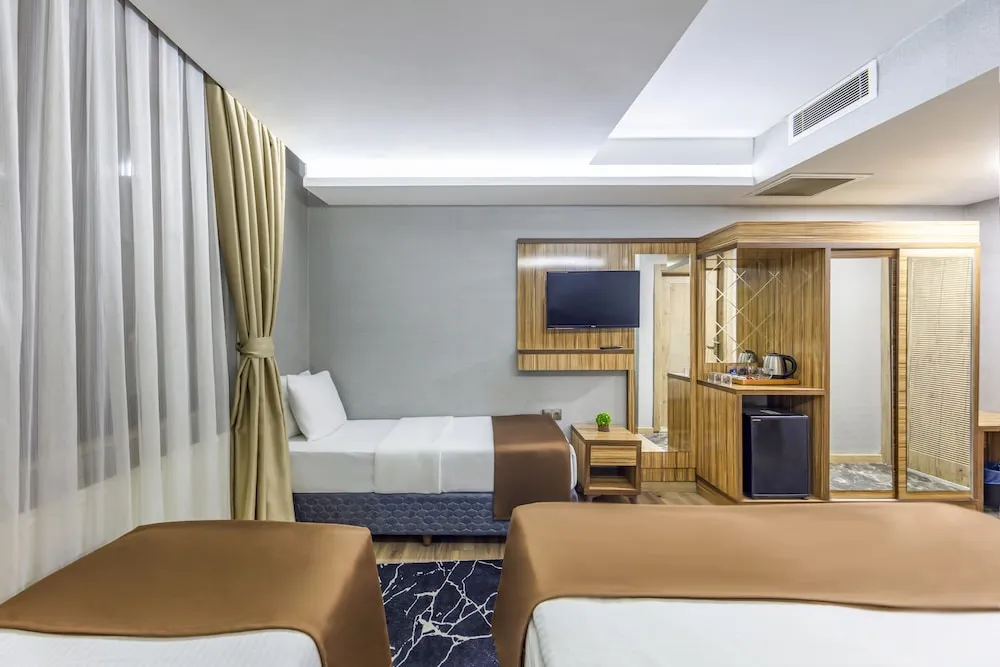 Deluxe Dört Kişilik Oda