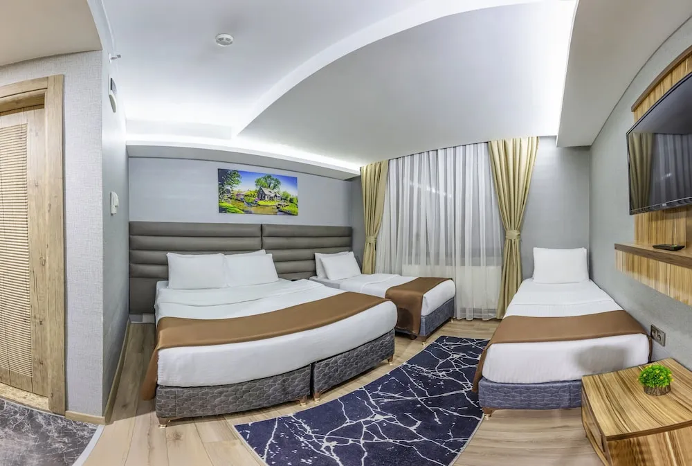 Deluxe Dört Kişilik Oda