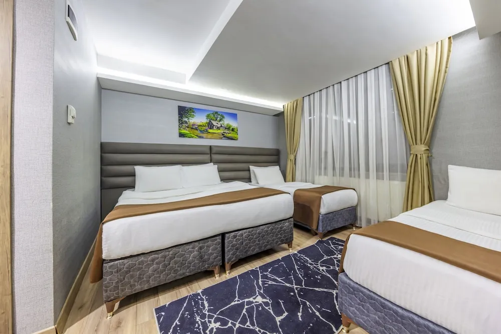 Deluxe Dört Kişilik Oda