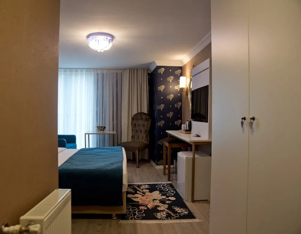 Deluxe Tek Büyük Yataklı Oda