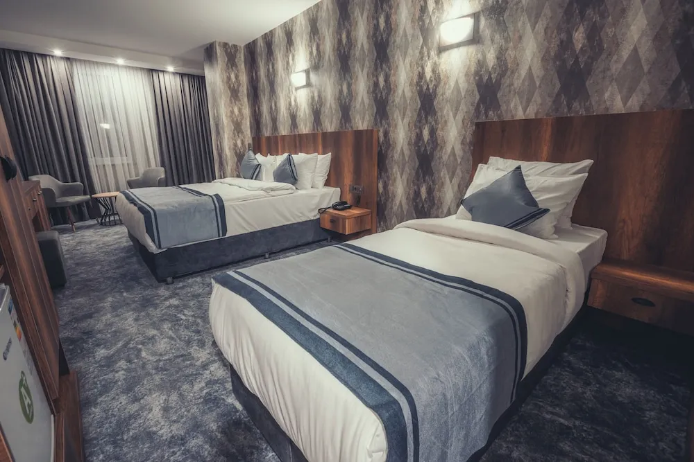 Deluxe Üç Kişilik Oda