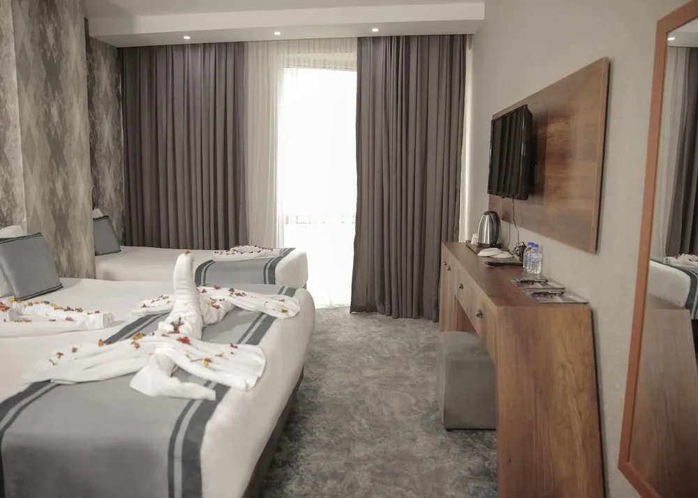 Deluxe Üç Kişilik Oda