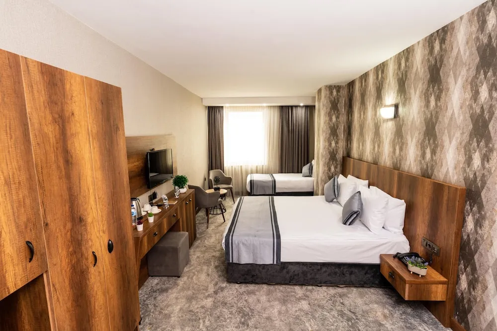 Deluxe Üç Kişilik Oda