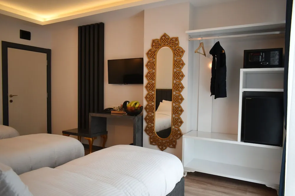 Deluxe Üç Kişilik Oda