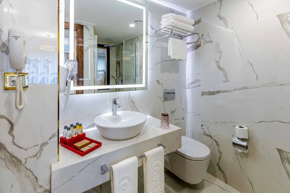 Deluxe Üç Kişilik Oda