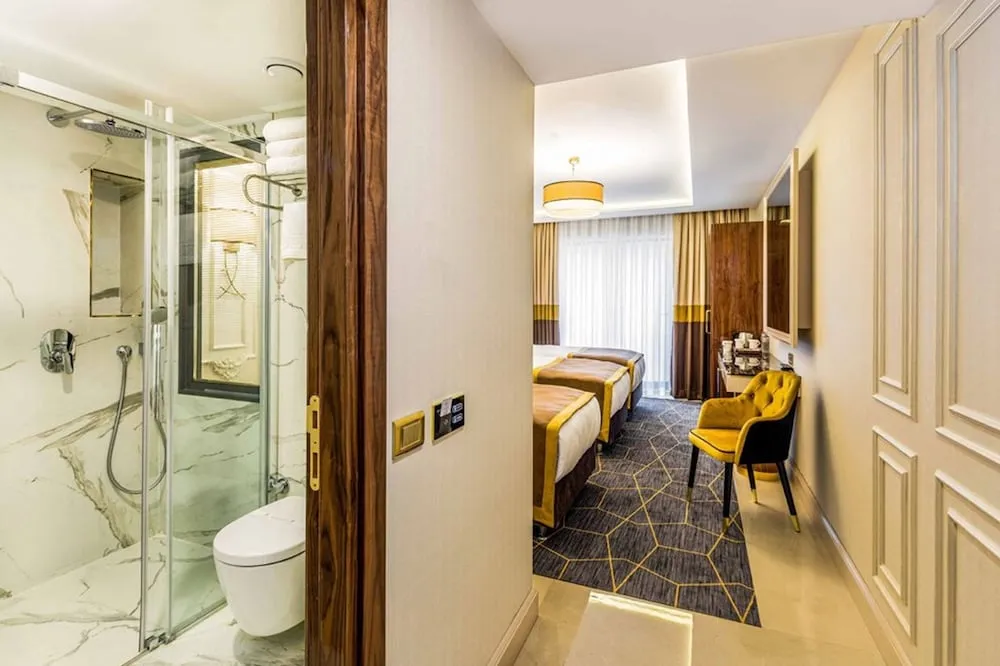 Deluxe Üç Kişilik Oda