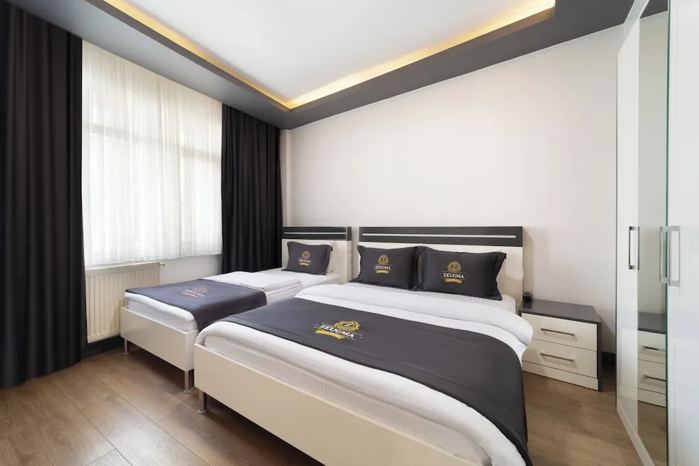 Executive Üç Kişilik Oda