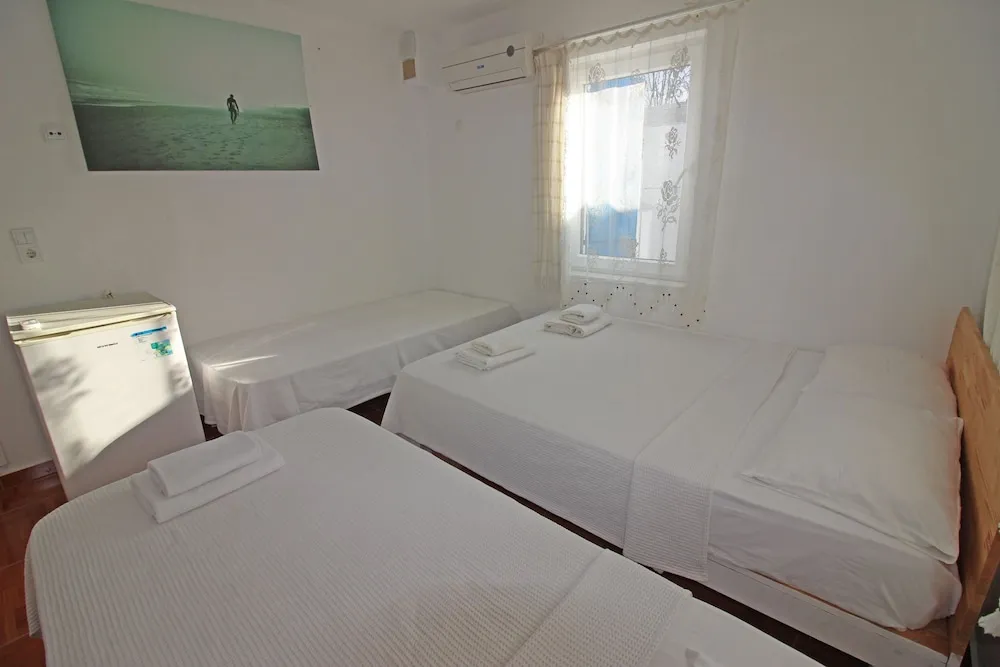 Standard Dört Kişilik Oda, Bahçe Manzaralı