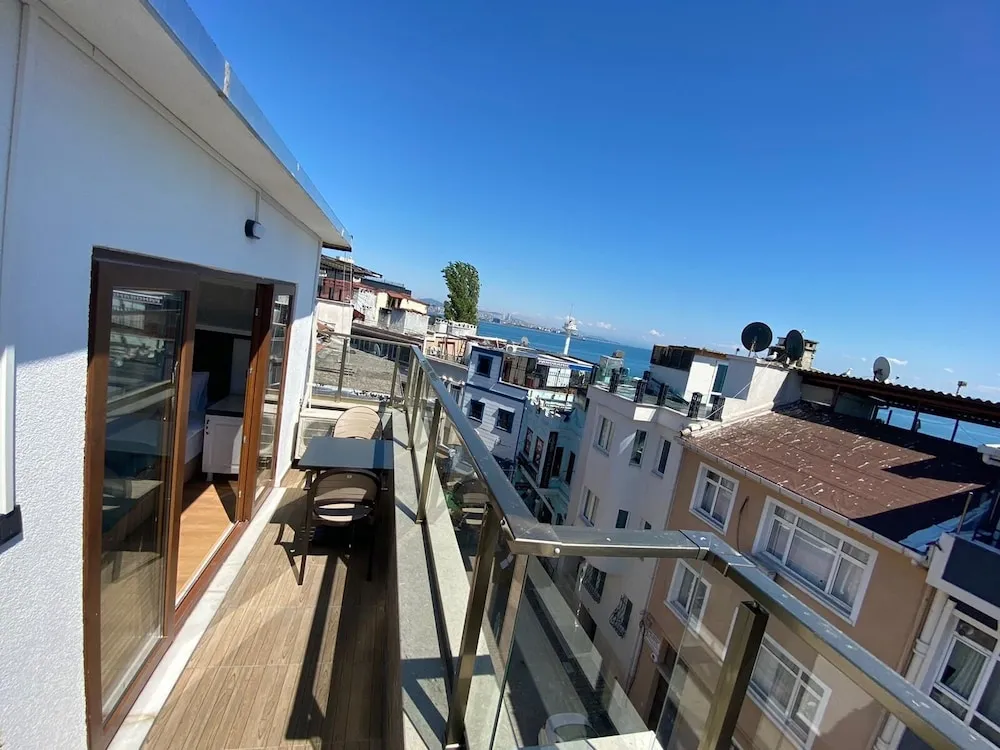 Deluxe Üç Kişilik Oda, Balkon, Deniz Manzaralı