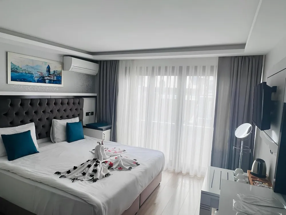 Deluxe Üç Kişilik Oda, Balkon, Deniz Manzaralı