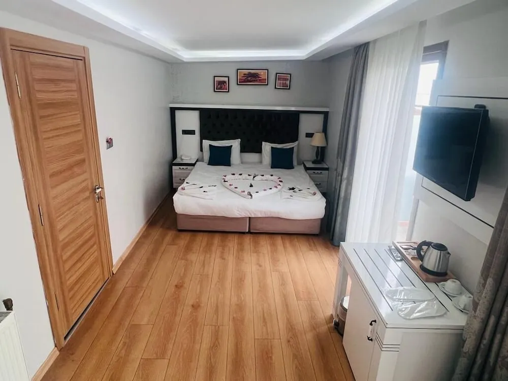 Deluxe Tek Büyük Yataklı Oda, Balkon, Deniz Manzaralı