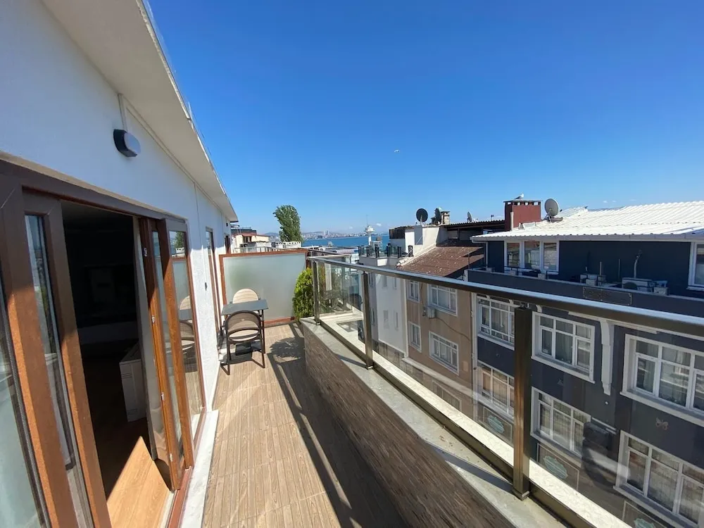 Deluxe Tek Büyük Yataklı Oda, Balkon, Deniz Manzaralı