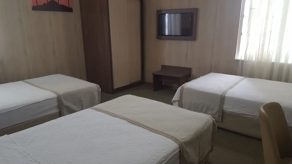 Üç Kişilik Oda