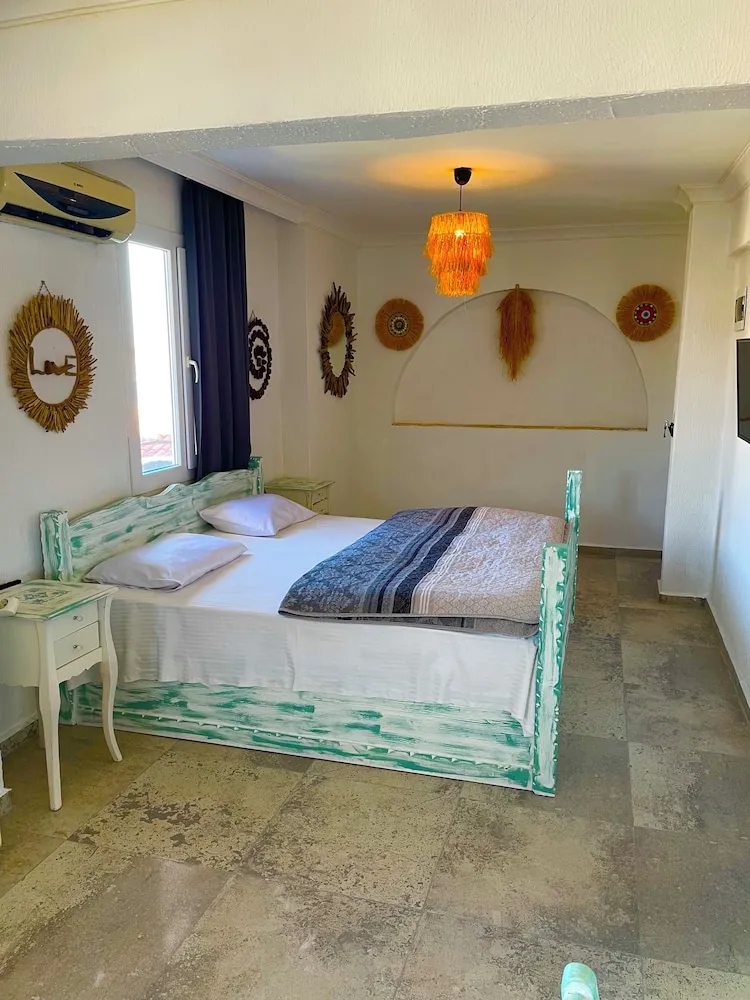Standard Üç Kişilik Oda, Bahçe Manzaralı