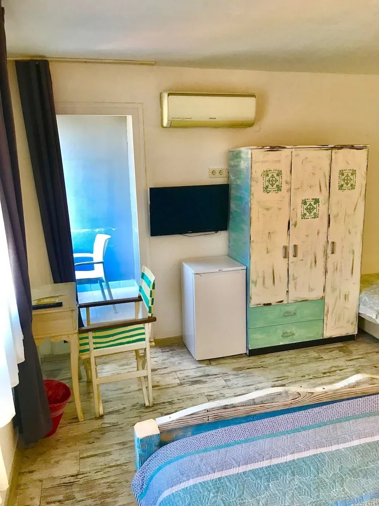 Standard Üç Kişilik Oda, Bahçe Manzaralı